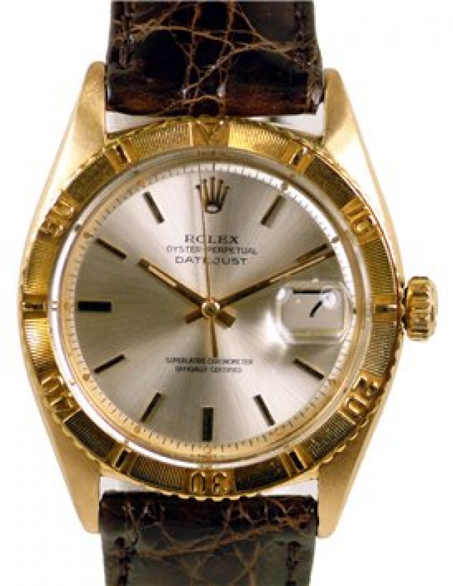 Rolex 6609 Yellow Gold on Strap, Engine Turned Bezel Steel with Gold Index
